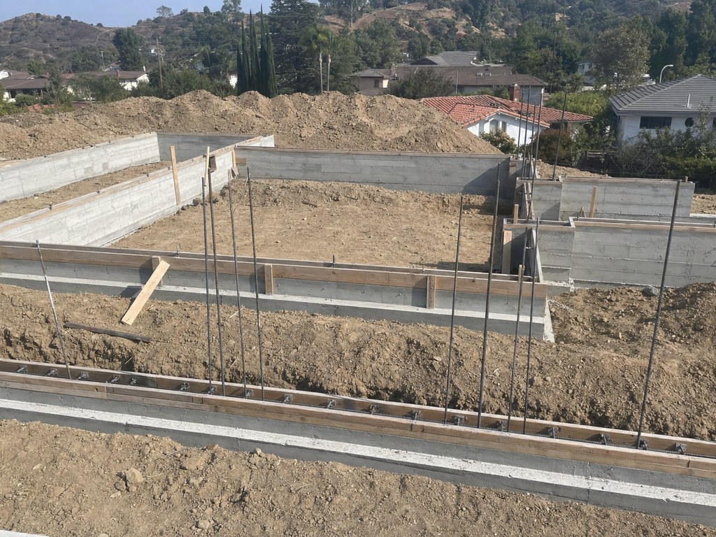Rebar-reinforced concrete foundation at a Stockton job site
