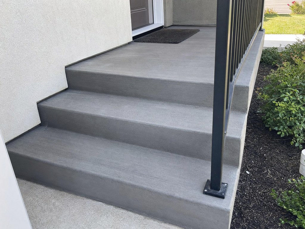 Newly poured concrete front entry steps at a Stockton home